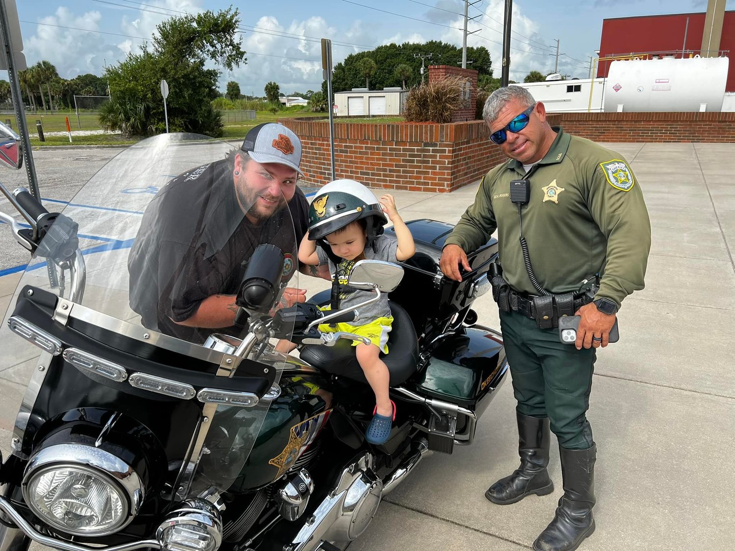 Senior Deputy Adrian Rogers (right) took a little time out of his day to make a young man feel special.